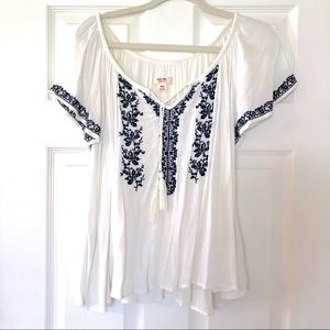 White Mexican style blouse with navy embroidery
